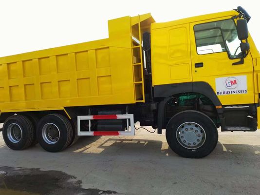 Manual Transmission Type Sinotruk HOWO Dumper Truck 10 Wheeler Yellow Color Tipping Truck